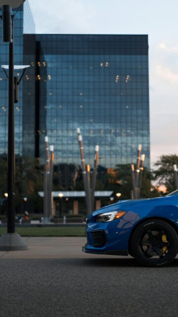 Subaru WRX STI Blue JDM Sports Car at Dusk Mobile Wallpaper