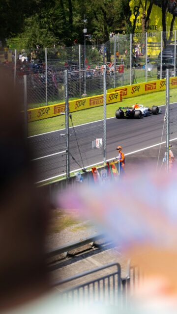 Formula 1 Visa Cash App RB Car on Track at Monza Wallpaper