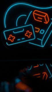 Neon Gaming Controller and Retro Console Abstract Art Wallpaper
