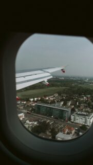 Stunning Aerial Airplane Window View Over Suburbia Phone Wallpaper
