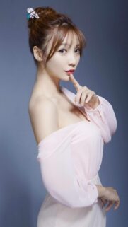 Beautiful Asian Model in Pastel Pink Blouse Portrait Wallpaper