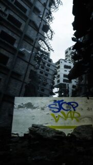 Stark Stop War Graffiti in Ruined City Streets Mobile Wallpaper