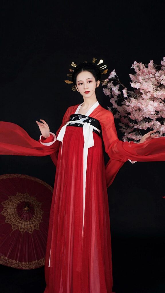 Stunning Chinese Traditional Hanfu Woman with Sakura Flowers Wallpaper
