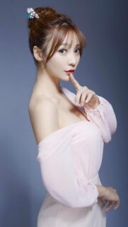 Elegant Asian Beauty in Soft Pink Blouse Mobile Wallpaper
