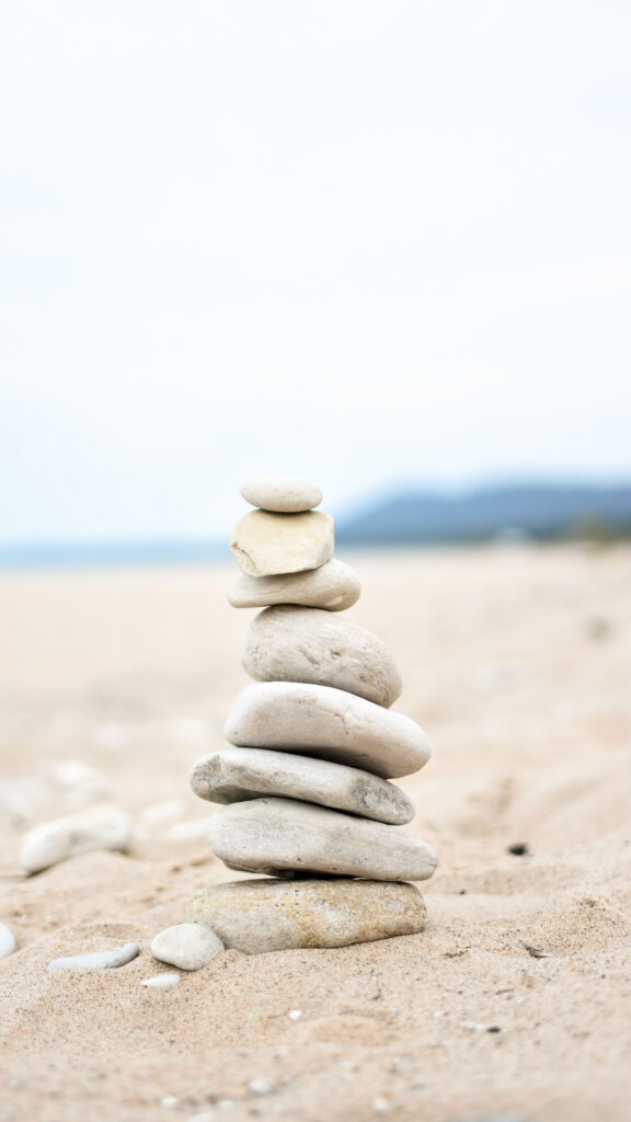 Zen Stone Stacking Balance and Mindful Manifestation Energy Wallpaper