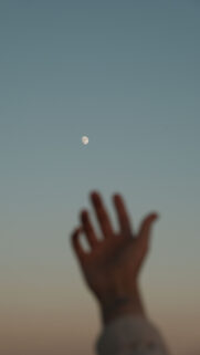 Reaching for the Waxing Gibbous Moon Spiritual Energy Wallpaper