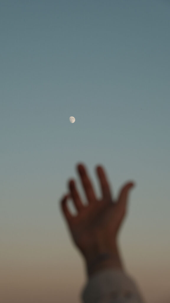Reaching for the Waxing Gibbous Moon Spiritual Energy Wallpaper