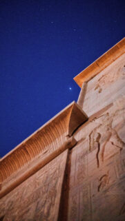 Ancient Egyptian Temple Under Starlit Night Sky Spiritual Energy Wallpaper
