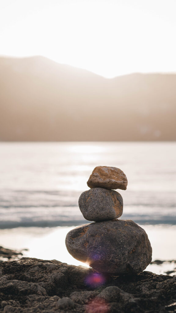 Zen Stone Stacking for Grounding and Abundance Mindset Wallpaper