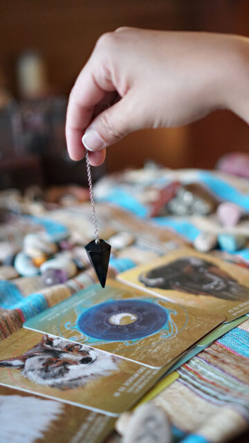Spiritual Pendulum Dowsing and Animal Spirit Oracle Card Wallpaper