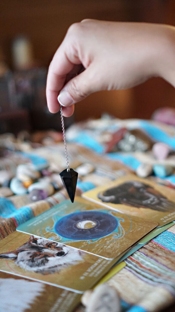 Spiritual Pendulum Dowsing and Animal Spirit Oracle Card Wallpaper