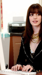 Anne Hathaway as Andy Sachs in The Devil Wears Prada Mobile Wallpaper