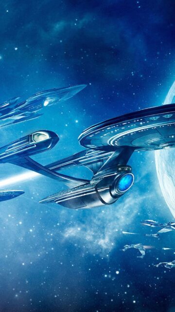 Star Trek Starships Battling in Deep Space Mobile Wallpaper