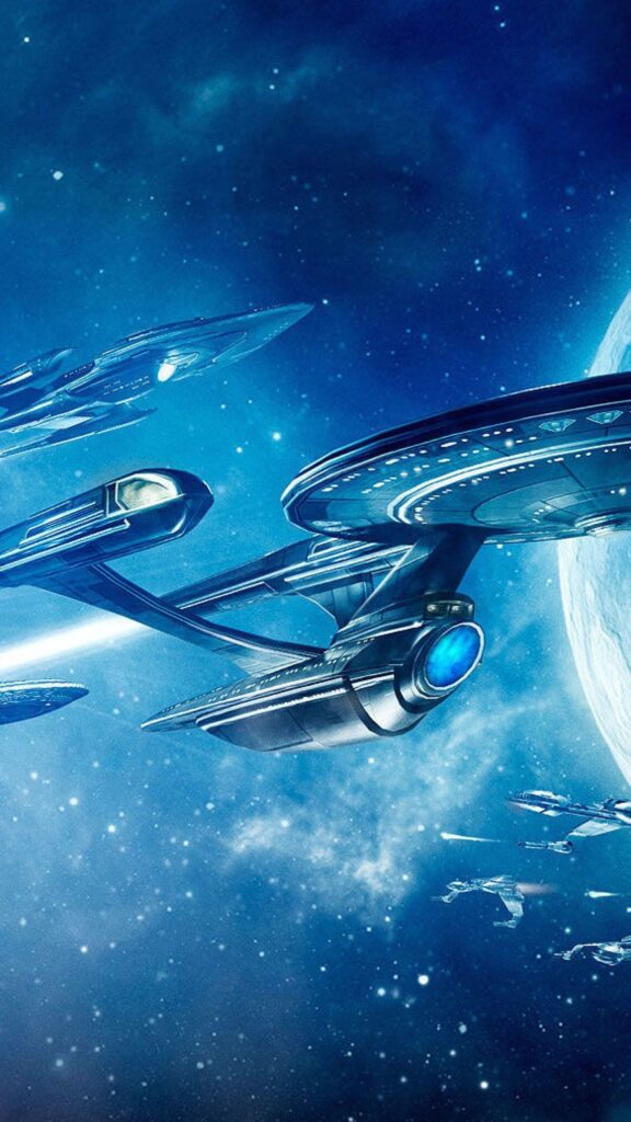 Star Trek Starships Battling in Deep Space Mobile Wallpaper