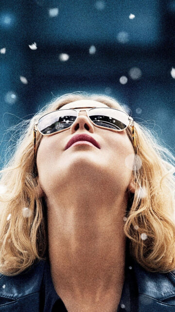 Jennifer Lawrence Looking Up at Snow Mobile Wallpaper