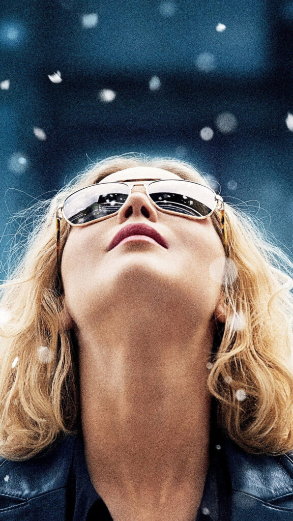 Jennifer Lawrence Looking Up at Snow Mobile Wallpaper