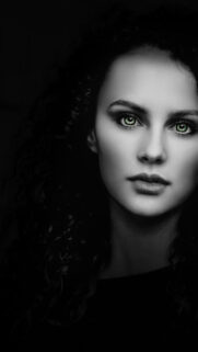 Stunning Portrait of a Woman with Green Eyes Mobile Wallpaper