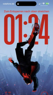 Spider-Man Miles Morales Leaping Over NYC Mobile Wallpaper