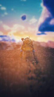 Astronaut Standing in Alien Field Mobile Wallpaper
