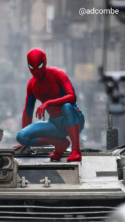 Spider-Man Crouching on a Tank Mobile Wallpaper
