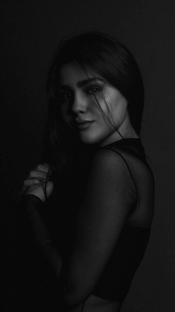Elegant Black and White Portrait of a Woman Mobile Wallpaper