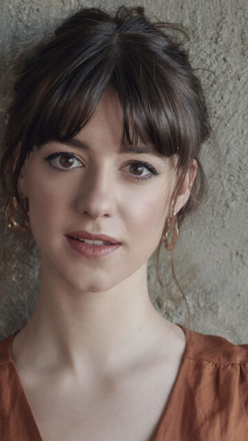 Portrait of a Young Woman with Brown Hair Mobile Wallpaper