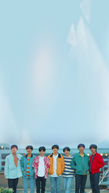 BTS Group Portrait Standing Against a Bright Sky Mobile Wallpaper