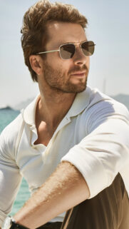 Sun-Kissed Man in White Polo Portrait Mobile Wallpaper