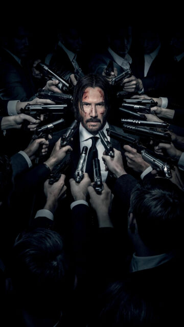 John Wick Surrounded by Guns Mobile Wallpaper