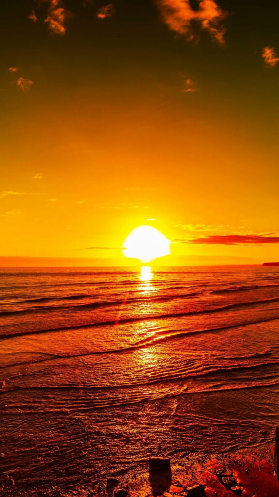Stunning Golden Sunset Over the Ocean Mobile Wallpaper