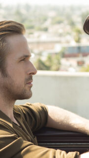 Close-up Portrait of Ryan Gosling in Olive Shirt Mobile Wallpaper