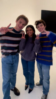 Young Cast Trio Posing Peace Signs Mobile Wallpaper