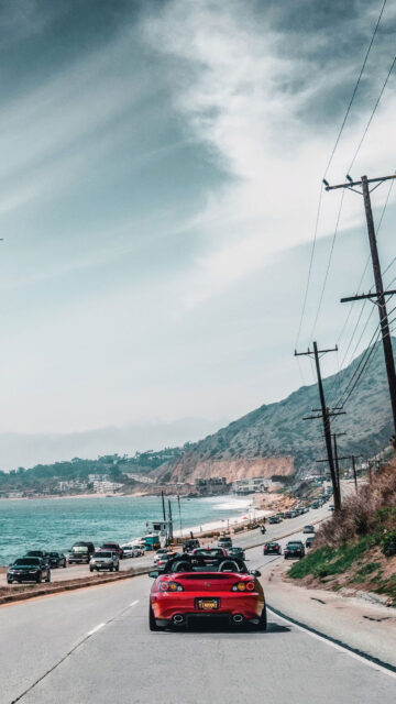 Coastal Drive Luxury Lifestyle and Prosperity Manifestation Wallpaper