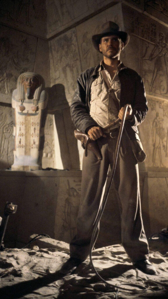 Indiana Jones Standing in Ancient Tomb Mobile Wallpaper