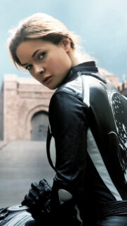 Ilsa Faust Motorcycle Suit Portrait Mobile Wallpaper