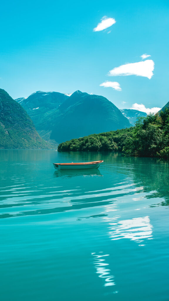 Serene Turquoise Fjord with a Lonely Boat Mobile Wallpaper