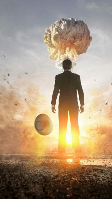 Man Standing Amidst Explosion Surreal Art Mobile Wallpaper