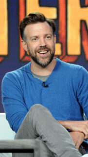Portrait of Jason Sudeikis in a Blue Sweater Mobile Wallpaper