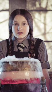 Young Witch Brewing Potions Mobile Wallpaper