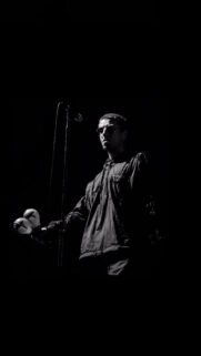 Liam Gallagher Live Performance Portrait Mobile Wallpaper