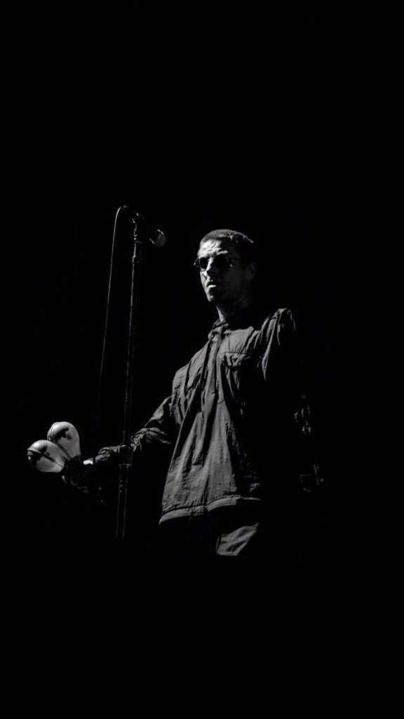 Liam Gallagher Live Performance Portrait Mobile Wallpaper