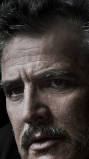 Gritty Close-up Portrait of a Mature Bearded Man Mobile Wallpaper