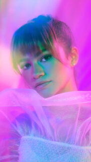 Zendaya Cinematic Neon Glow Portrait Mobile Wallpaper