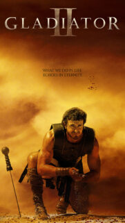 Gladiator II Warrior Crouching in Golden Dust Mobile Wallpaper