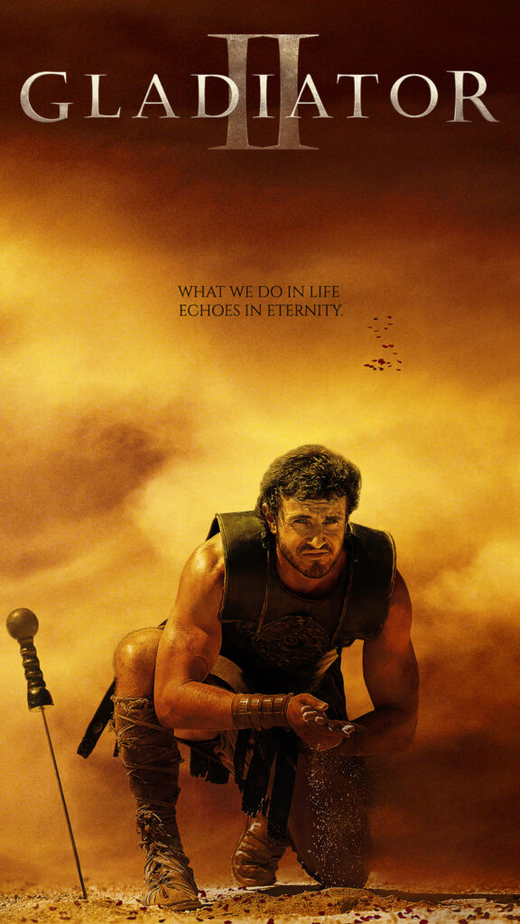 Gladiator II Warrior Crouching in Golden Dust Mobile Wallpaper