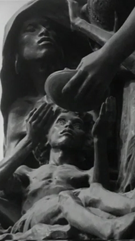 Sculptural Depiction of Suffering and Compassion Mobile Wallpaper