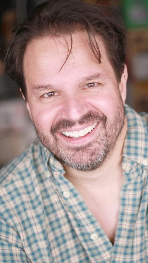 Happy Smiling Man in Plaid Shirt Portrait Mobile Wallpaper