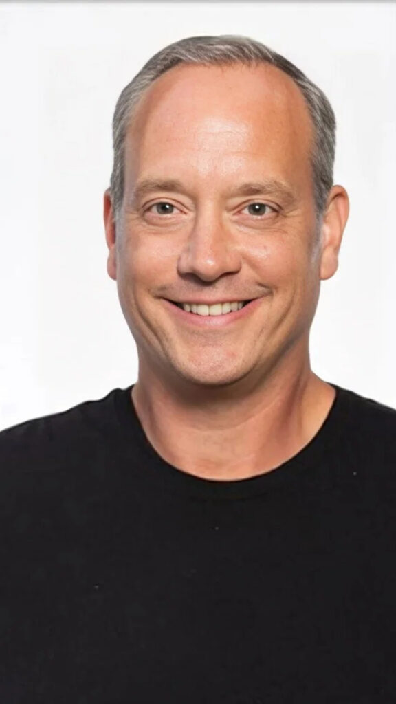 Middle-aged Man Smiling Portrait Mobile Wallpaper