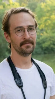 Portrait of a Man with Glasses and Mustache Mobile Wallpaper