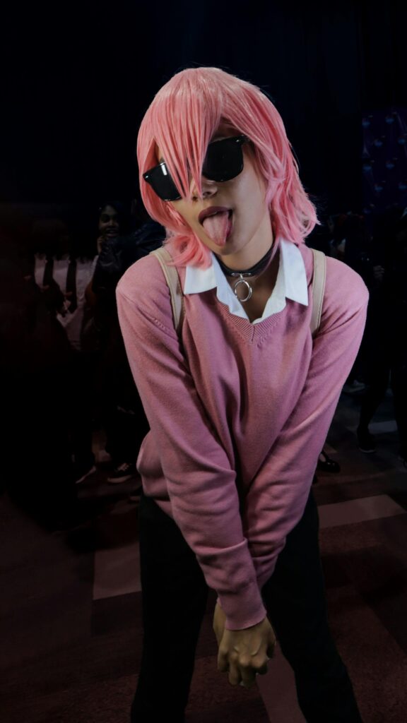 Anime Cosplay Girl with Pink Hair and Sunglasses Phone Wallpaper